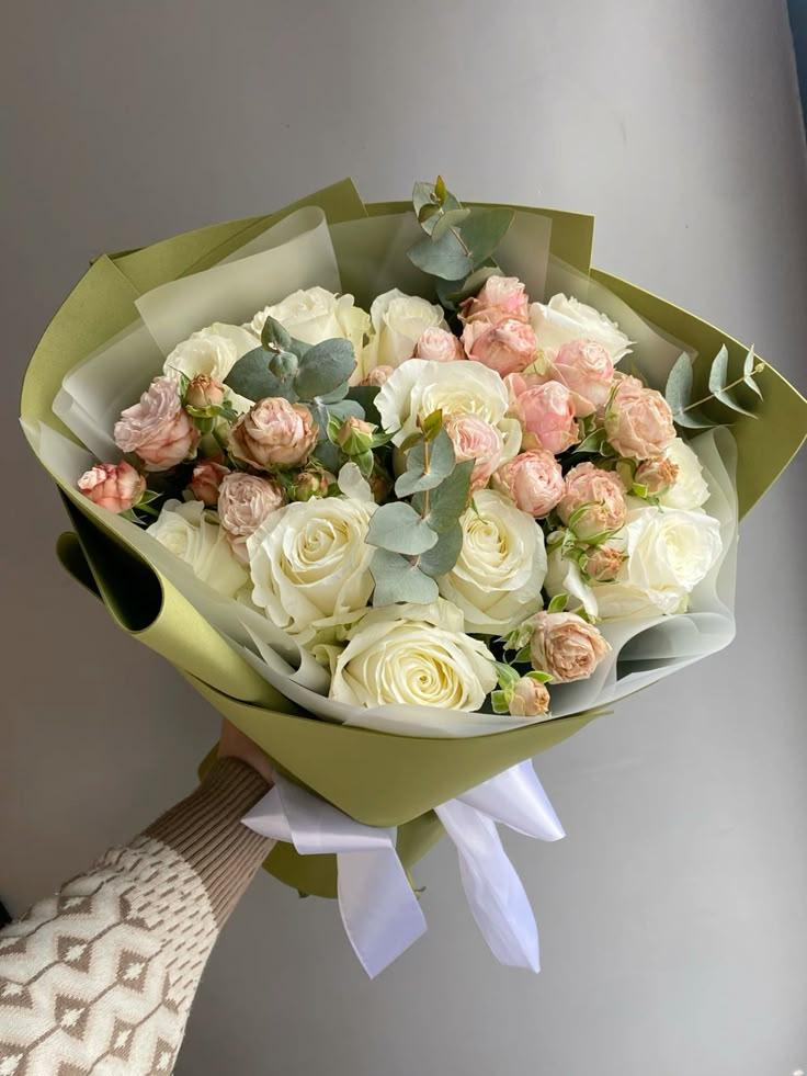 Corporate meeting room with carefully timed floral arrangements that maintain elegance throughout business hours